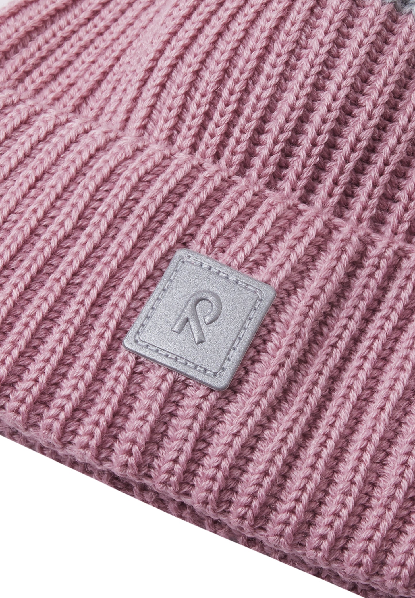 Reima Mütze<br>Pilke <br>Gr. 48/50, 52/54, 56/58 <br>eingenähtes reflektierendes Garn <br>innen hautfreundliches Fleece<br> aussen warmer, wasserabweisender Woll-Mix<br> Windstopper-Membrane im Ohrbereich