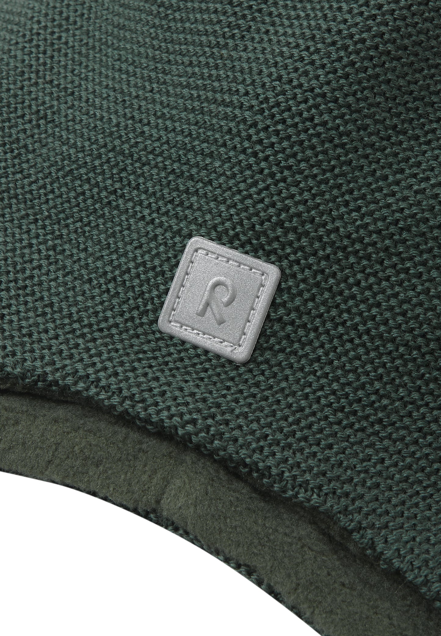 Reima Mütze<br> Pipopaa/Huurre<br>Gr. 50 bis 56 <br>innen hautfreundliches Fleece<br> aussen warme, wasserabweisende Merino-Wolle<br>Windstopper-Membrane im Ohrbereich<br> länger geschnitten im Ohrbereich ohne Bändel