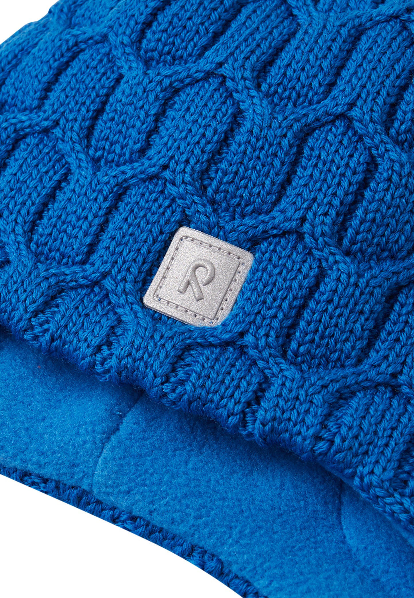 REIMA Mütze mit Bändel <br>Nunavut <br>Gr. 46 bis 54 <br>innen hautfreundliches Fleece<br> aussen warme, wasserabweisende Merino-Wolle<br> Windstopper-Membrane im Ohrbereich