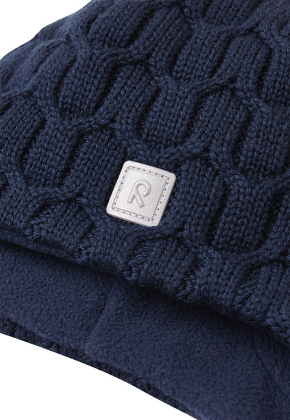 REIMA Mütze mit Bändel <br>Nunavut <br>Gr. 46 bis 54 <br>innen hautfreundliches Fleece<br> aussen warme, wasserabweisende Merino-Wolle<br> Windstopper-Membrane im Ohrbereich